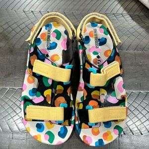 Brand new Mini Melissa sandals . Size US3